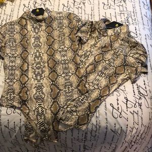 Women’s snake skin bodysuit, size Medium. Brand new